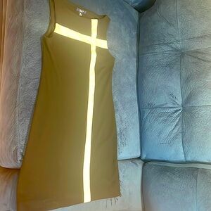 Short, black dress with white block stripe.